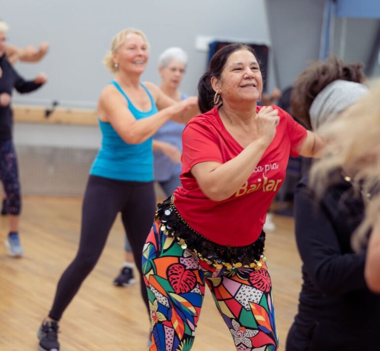 the-workout-club-londonderry-nh-location-near-me-fitness-membership-senior-zumba-class-women-colorful-dance-workout-low-impact-active aging