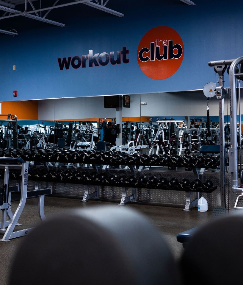 the-workout-club-manchester-nh-location-near-me-fitness-cardio-lifting-weights-amenities-blue-orange