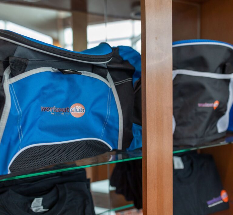 the-workout-club-salem-nh-location-near-me-fitness-membership-modern-gym-gym-bag-navy-blue-orange-logo-beyond-fitness-buy